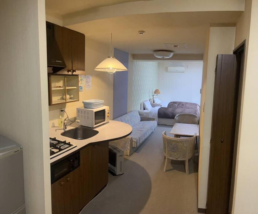 フューデイズコンドミニアム定山渓201号室 Apartment Sapporo Bagian luar foto