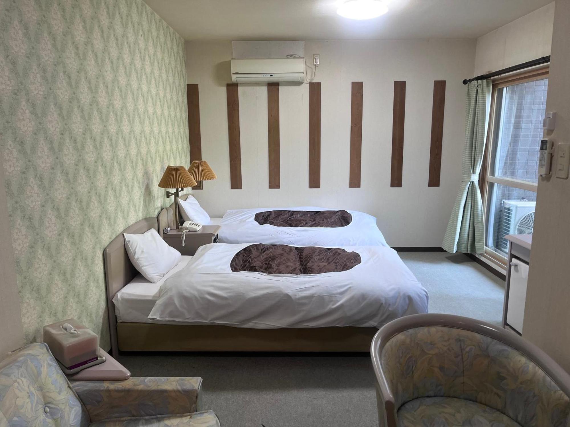 フューデイズコンドミニアム定山渓201号室 Apartment Sapporo Ruang foto